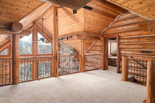 N8070 Wanlass Rd, Mindoro, WI 54644 - additional living space featuring carpet floors, wood ceiling, a ceiling fan, and lofted ceiling with beams