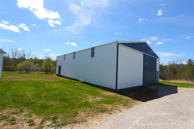 W7675 Moonshine Hill Rd, Wausaukee, WI 54177 - view of pole building with a lawn