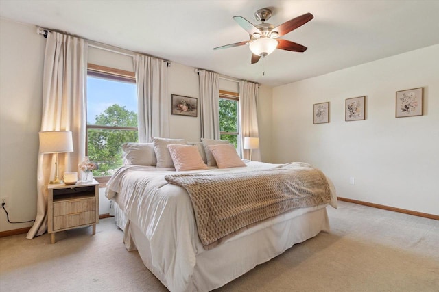 178 Weybridge Dr, Sun Prairie, WI 53590 - bedroom with light colored carpet, baseboards, and ceiling fan