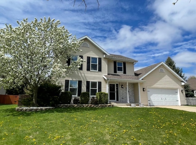 178 Weybridge Dr, Sun Prairie, WI 53590 - view of front facade with an attached garage, driveway, and roof with shingles