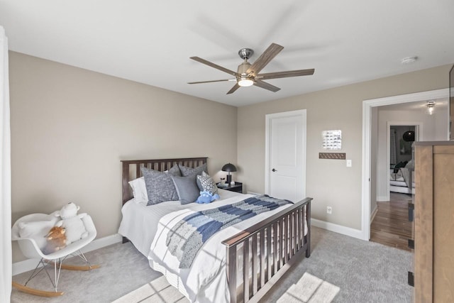 W246N1979 Still River Dr, Pewaukee, WI 53072 - carpeted bedroom with baseboards and a ceiling fan