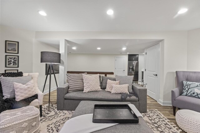 W246N1979 Still River Dr, Pewaukee, WI 53072 - living area with recessed lighting, light wood-style floors, and baseboards