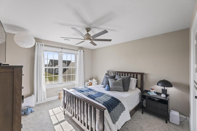 W246N1979 Still River Dr, Pewaukee, WI 53072 - bedroom with carpet flooring, baseboards, and a ceiling fan