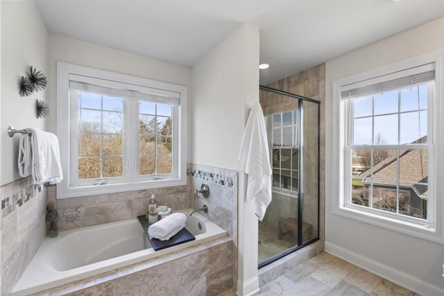 W246N1979 Still River Dr, Pewaukee, WI 53072 - bathroom with a bath, a shower stall, and baseboards