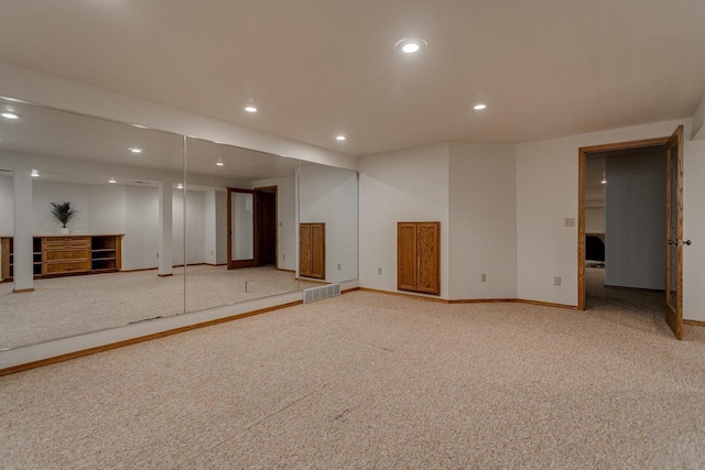 4510 Choctaw Trl, Green Bay, WI 54313 - finished basement featuring visible vents, baseboards, recessed lighting, and light colored carpet
