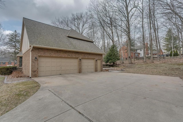 4510 Choctaw Trl, Green Bay, WI 54313 - view of side of home featuring roof with shingles, brick siding, and driveway