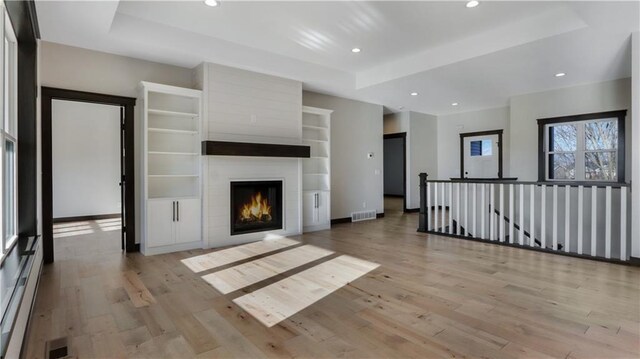 LOT3 510th Ave, Menomonie, WI 54751 - unfurnished living room featuring recessed lighting, visible vents, and light wood-type flooring