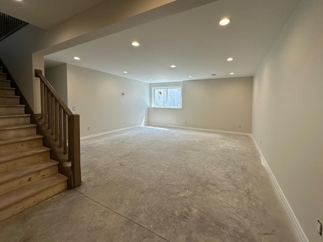 1310 Spahn Dr, Waunakee, WI 53597 - below grade area with stairs, recessed lighting, and baseboards