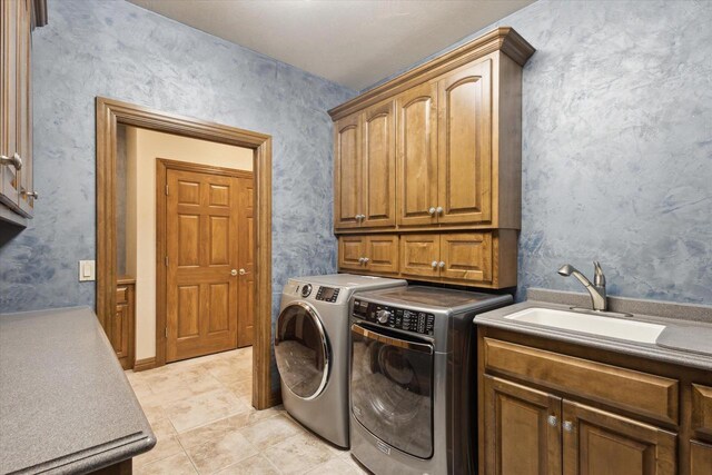 1716 Symphony Hts, Green Bay, WI 54311 - clothes washing area with cabinet space, washing machine and dryer, and a sink