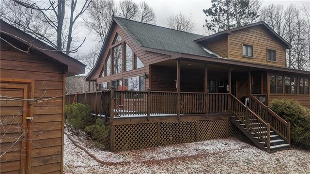 6009 W Dobbert Rd, Winter, WI 54896 - back of house featuring a sunroom and roof with shingles