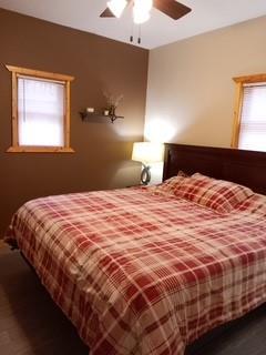 2757 28 1/4 St, Birchwood, WI 54817 - bedroom with carpet and a ceiling fan