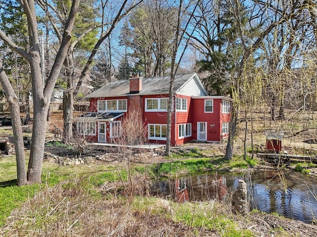 149 Oakwood Ave, Edgerton, WI 53534 - view of front facade with a chimney
