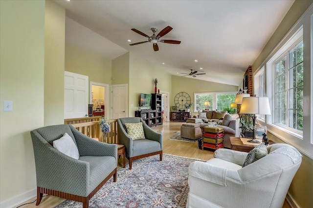 149 Oakwood Ave, Edgerton, WI 53534 - living area with wood finished floors, a ceiling fan, vaulted ceiling, and recessed lighting