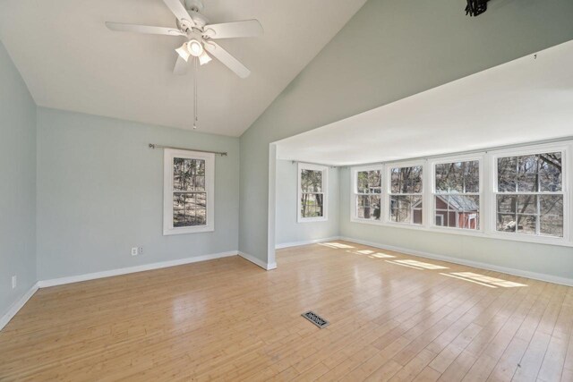 149 Oakwood Ave, Edgerton, WI 53534 - empty room with visible vents, baseboards, a ceiling fan, and wood finished floors