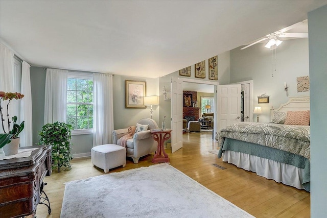 149 Oakwood Ave, Edgerton, WI 53534 - bedroom featuring light wood-style flooring, baseboards, a ceiling fan, and lofted ceiling