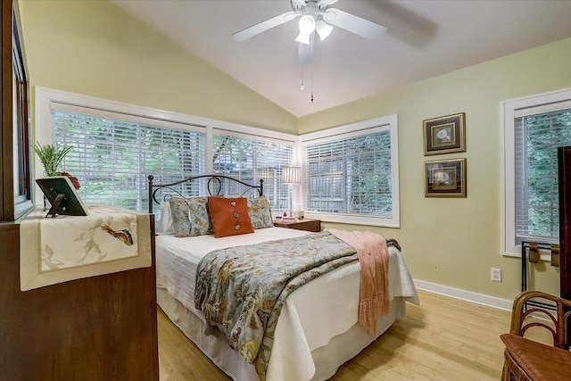 149 Oakwood Ave, Edgerton, WI 53534 - bedroom with light wood-style floors, baseboards, a ceiling fan, and vaulted ceiling