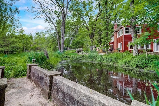 149 Oakwood Ave, Edgerton, WI 53534 - surrounding community with a water view