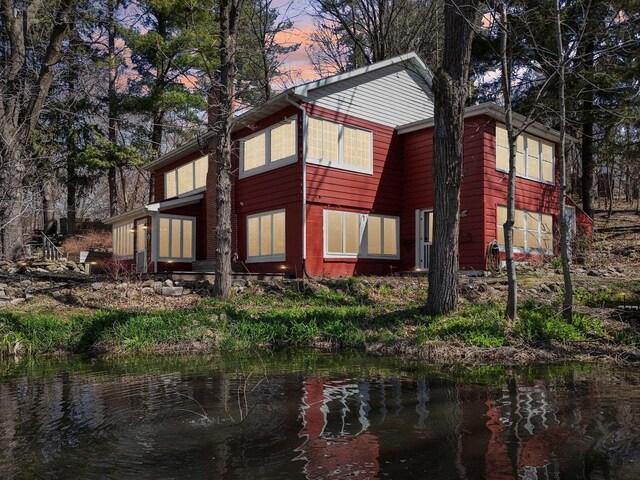 149 Oakwood Ave, Edgerton, WI 53534 - view of home's exterior with a water view