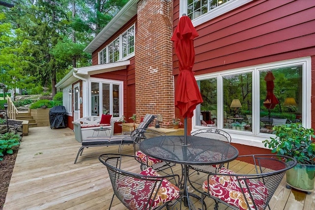 149 Oakwood Ave, Edgerton, WI 53534 - wooden terrace with area for grilling and outdoor dining area