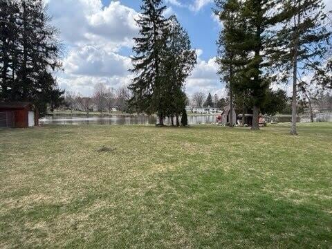 view of yard with a water view