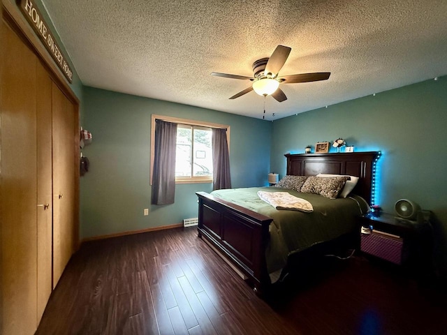 1411 Jennifer Ave, Tomah, WI 54660 - bedroom featuring a ceiling fan, a textured ceiling, baseboards, and dark wood finished floors