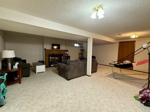 1411 Jennifer Ave, Tomah, WI 54660 - living room with a textured ceiling, light colored carpet, and a glass covered fireplace