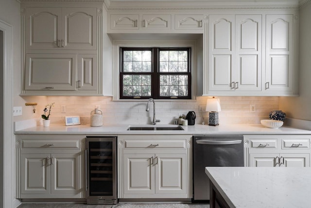 bar featuring a sink, stainless steel dishwasher, backsplash, and beverage cooler