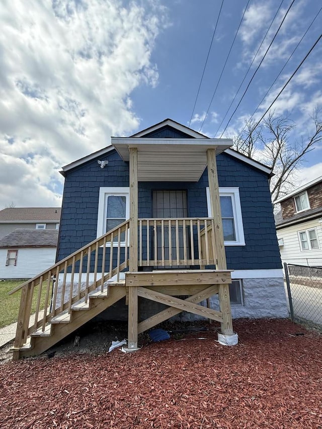 4813 N 36th St, Milwaukee, WI 53209 - rear view of house featuring a porch