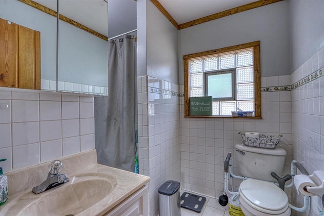 10439 W County Highway D, Exeland, WI 54835 - bathroom with vanity, tile walls, ornamental molding, and toilet