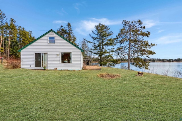 10439 W County Highway D, Exeland, WI 54835 - view of side of property with a deck with water view and a lawn