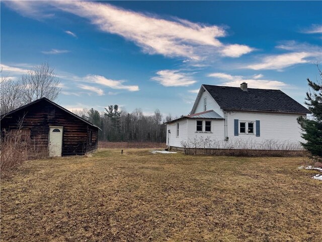 3168 W Howard St, Winter, WI 54896 - view of side of property featuring a lawn