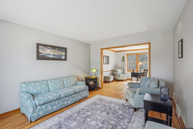 7817 Brule St, Madison, WI 53717 - living area featuring wood finished floors, baseboards, and visible vents