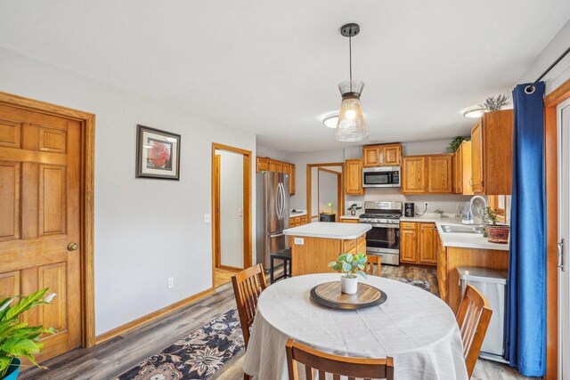 7817 Brule St, Madison, WI 53717 - dining room with light wood-type flooring and baseboards
