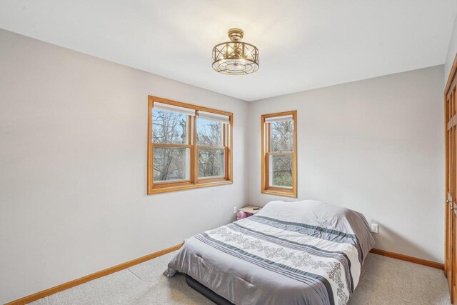 7817 Brule St, Madison, WI 53717 - bedroom with baseboards and carpet floors