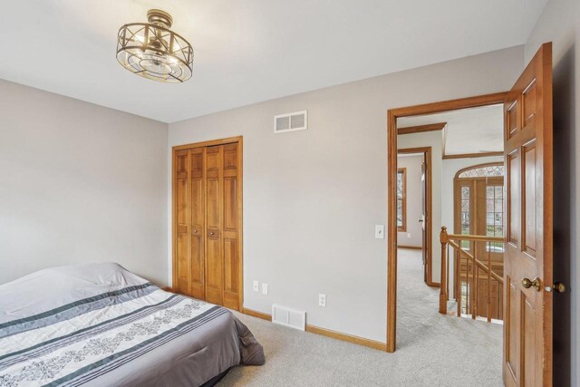7817 Brule St, Madison, WI 53717 - carpeted bedroom with a closet, baseboards, and visible vents