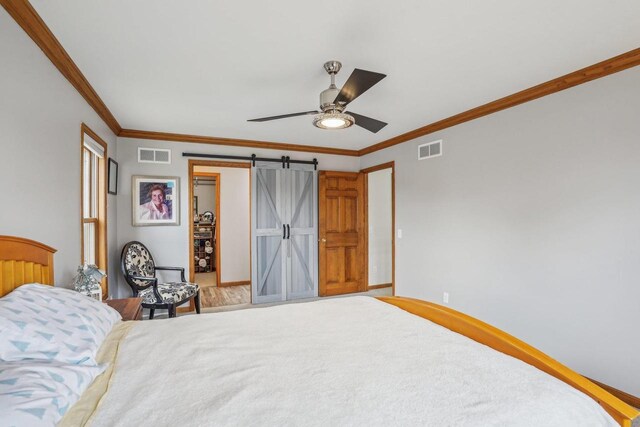 7817 Brule St, Madison, WI 53717 - bedroom with ornamental molding, visible vents, and a barn door