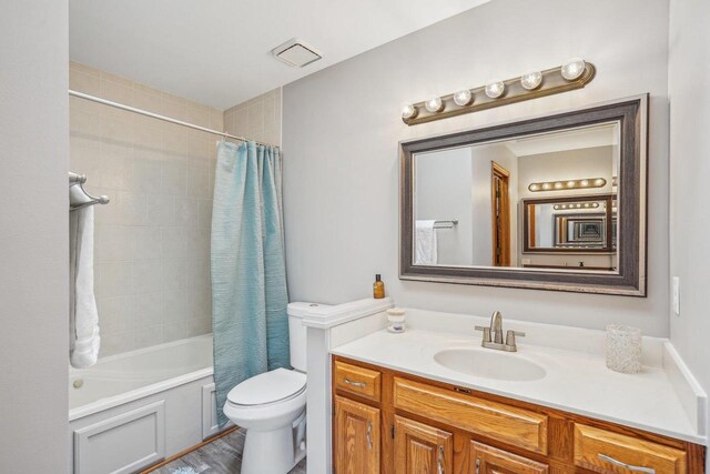 7817 Brule St, Madison, WI 53717 - full bath with shower / bath combo, vanity, visible vents, and toilet