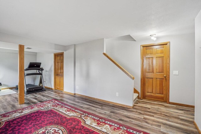7817 Brule St, Madison, WI 53717 - interior space featuring baseboards, stairway, and wood finished floors
