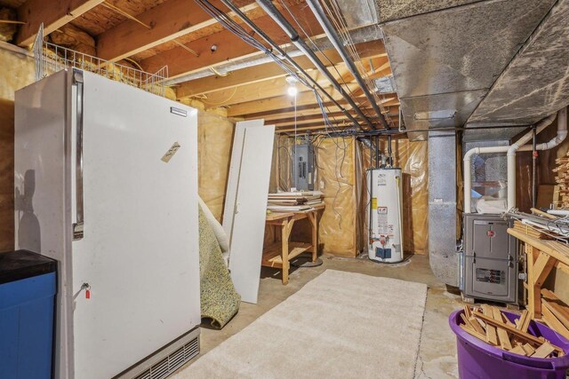 7817 Brule St, Madison, WI 53717 - unfinished below grade area featuring water heater, freestanding refrigerator, and electric panel