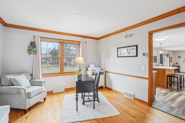 7817 Brule St, Madison, WI 53717 - home office with light wood-style floors and visible vents