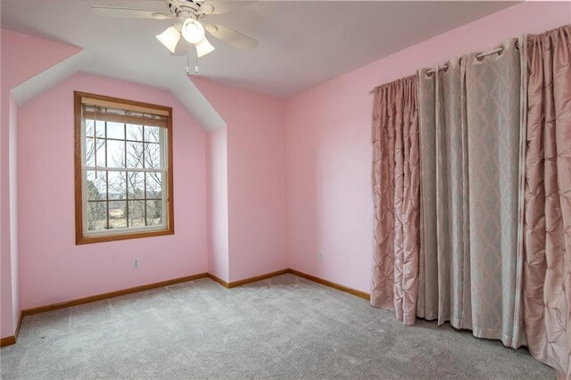 318 Meadow Lark Ln, Osceola, WI 54020 - interior space with ceiling fan, carpet flooring, baseboards, and vaulted ceiling