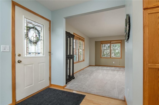 318 Meadow Lark Ln, Osceola, WI 54020 - entrance foyer with light wood-style floors and baseboards