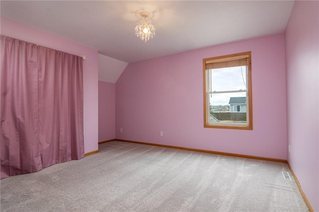 318 Meadow Lark Ln, Osceola, WI 54020 - additional living space featuring carpet flooring, baseboards, lofted ceiling, and visible vents