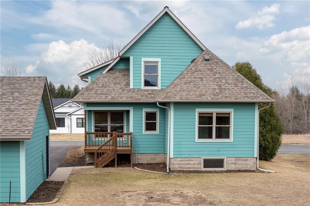 318 Meadow Lark Ln, Osceola, WI 54020 - back of property featuring a shingled roof