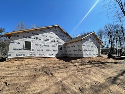 view of property exterior with a garage