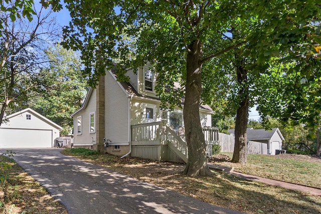 W3780 Cypress Dr, Lake Geneva, WI 53147 - view of front of house with a garage and an outbuilding