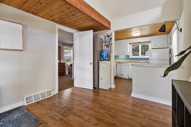 W3780 Cypress Dr, Lake Geneva, WI 53147 - kitchen with visible vents, white cabinets, light countertops, white appliances, and a peninsula