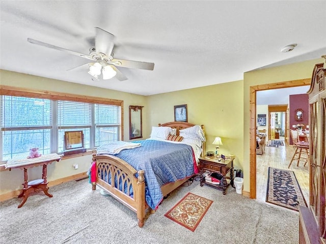 10244 124th St, Chippewa Falls, WI 54729 - bedroom with a textured ceiling, baseboards, a ceiling fan, and carpet floors