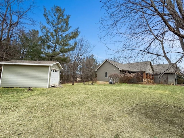 10244 124th St, Chippewa Falls, WI 54729 - view of yard with an outdoor structure and a detached garage