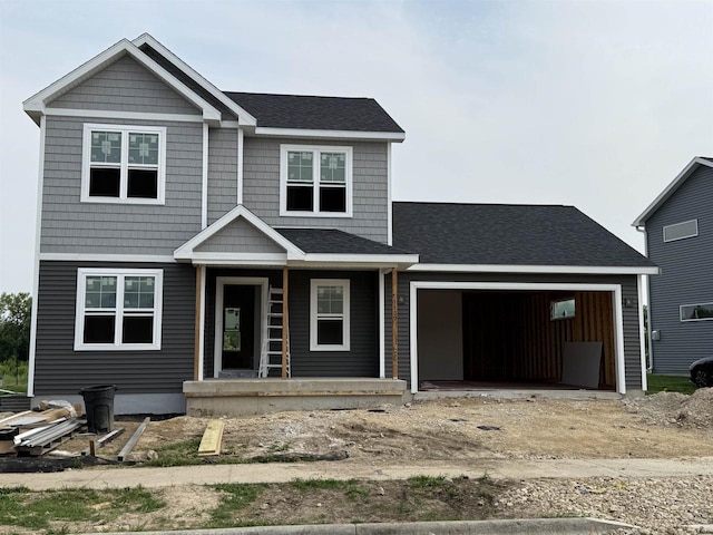 1107 Kampereschroer Way, Sun Prairie, WI 53590 - view of front of home with an attached garage, driveway, a porch, and roof with shingles